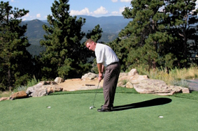 A backyard synthetic golf putting green in evergreen colorado